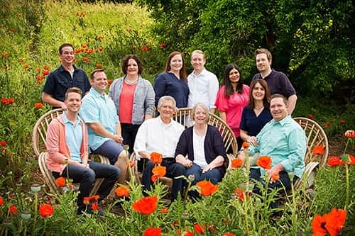 adult family with poppy flowers adult family portrait