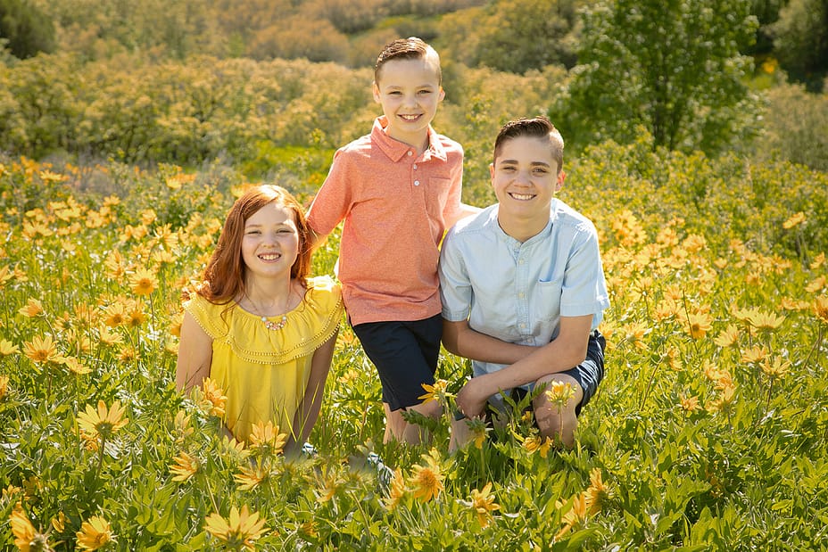 three-kids-in-wildflowers three kids in wildflowers